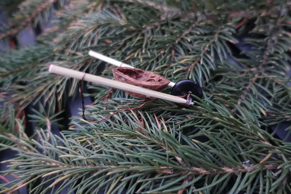 A wheelbarrow made out of a walnut