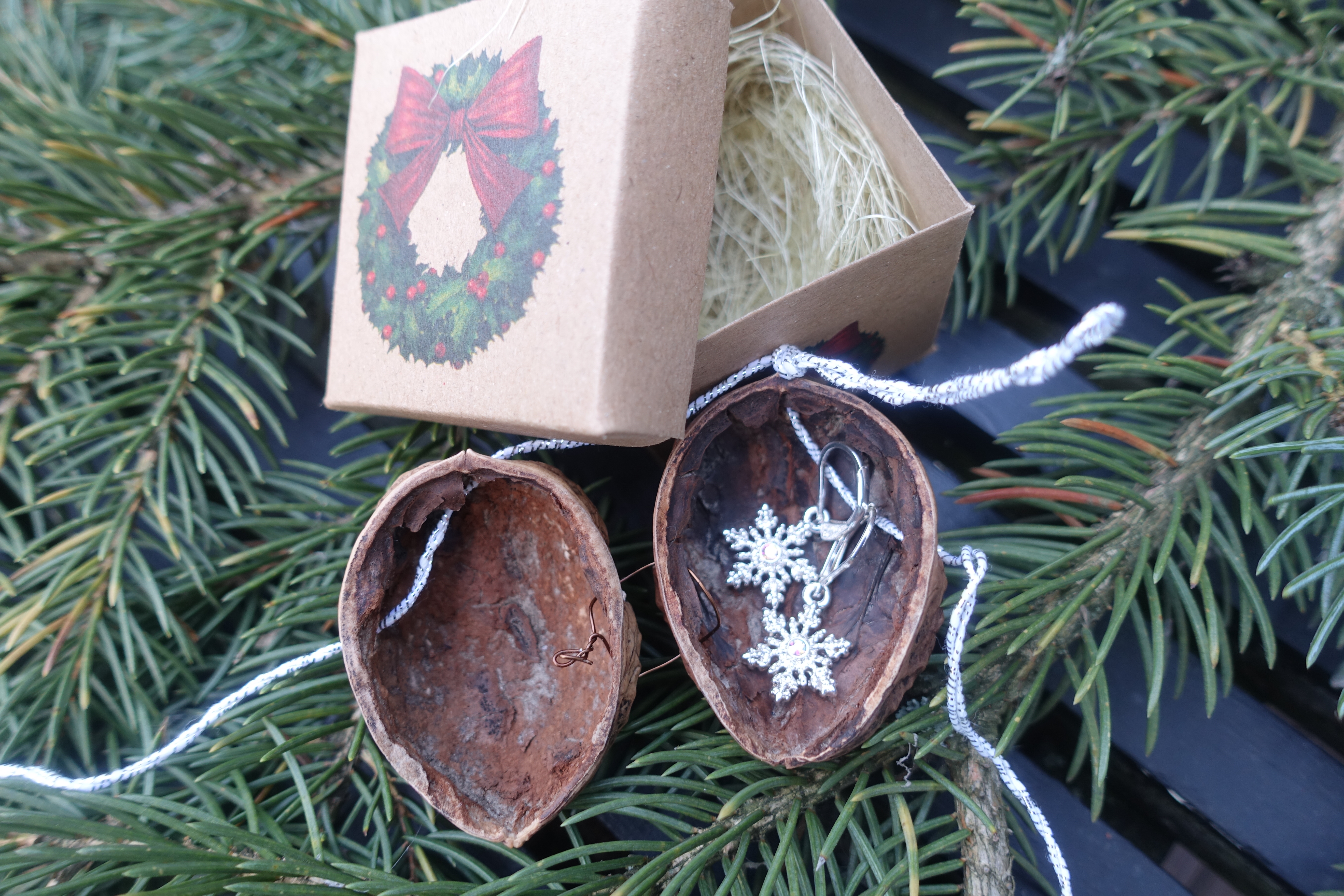 Earrings box made out of walnuts