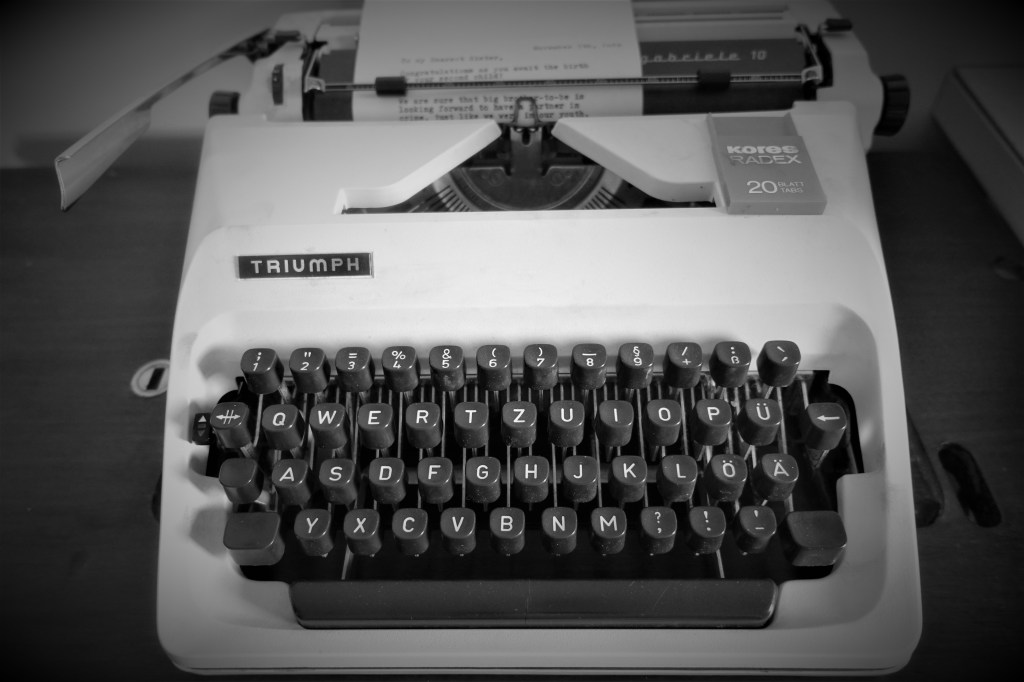 A black and white photo of a Triumph typewriter